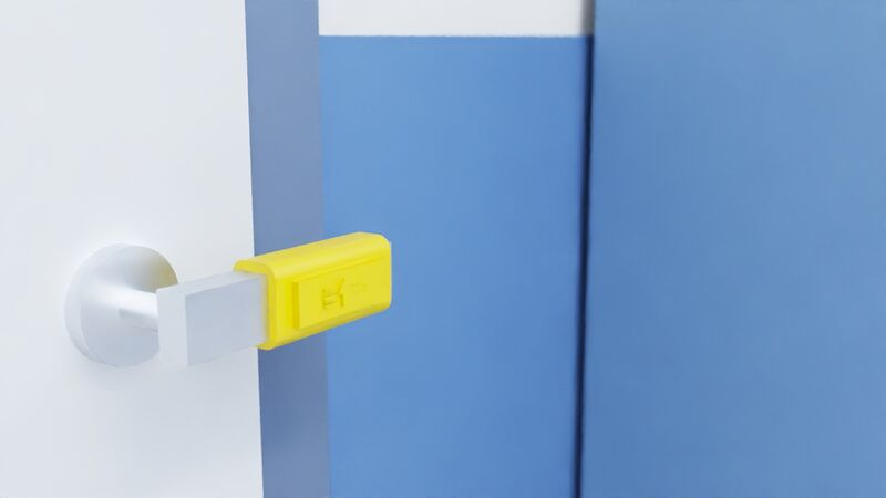 Render of a classroom door with a DALIL clip on the lever handle.